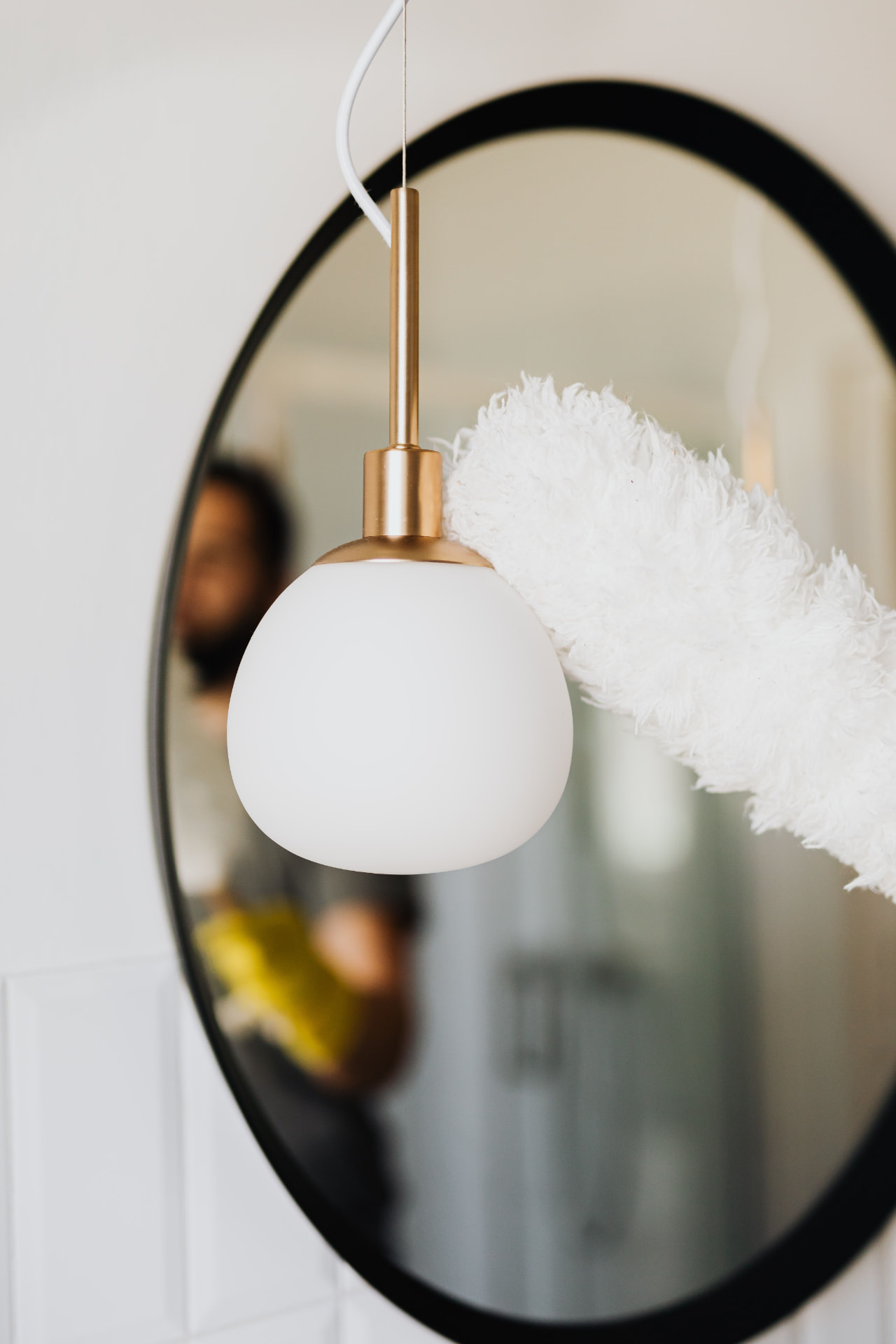 Detail cleaning of a mirror and light fixture